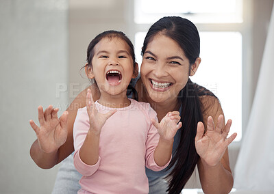 Buy stock photo Portrait of mother and child, smile with teeth and morning routine. Asian woman and toddler girl showing clean teeth after brushing it in the bathroom for fun, learning and child development