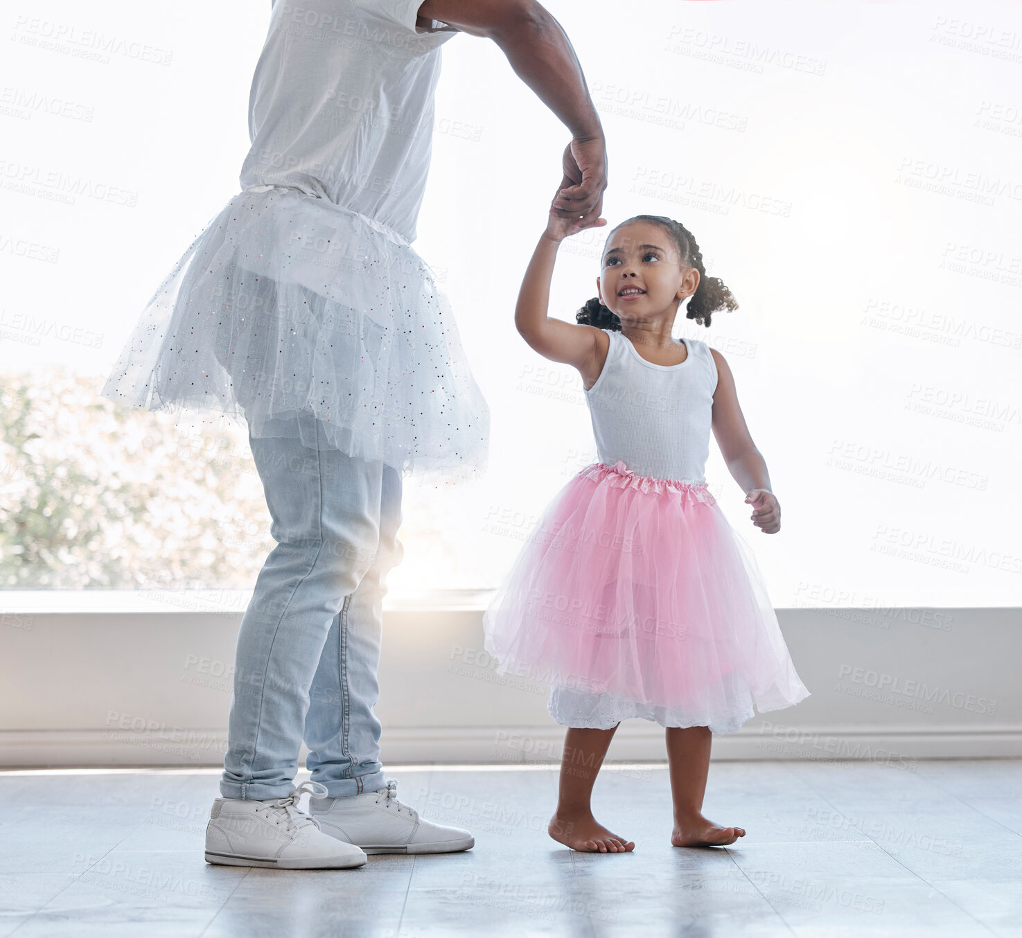 Buy stock photo Young girl, learning ballet with dad or teacher for fitness, fun and health at house. Female child dancer in costume dress, dancing with father or dance instructor, lesson on home porch or balcony