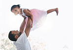 Family, dad and ballet girl happy and joyful with parent holding her in air for play time together. Trust, love and respect in childhood bond with young daughter and caring black father.
