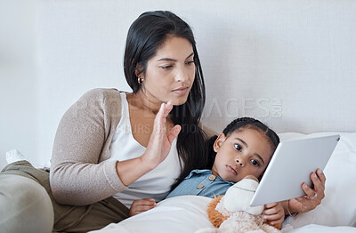 Buy stock photo Mother and sick child, video call and with tablet for telehealth online consultation for daughter lying in bed. Serious woman and kid in bedroom greeting with 5g network communication for healthcare