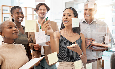 Buy stock photo Team of workers in office, brainstorming together and writing  idea on sticky notes at glass board. Management teamwork, thinking and planning new strategy for company with goals on paper