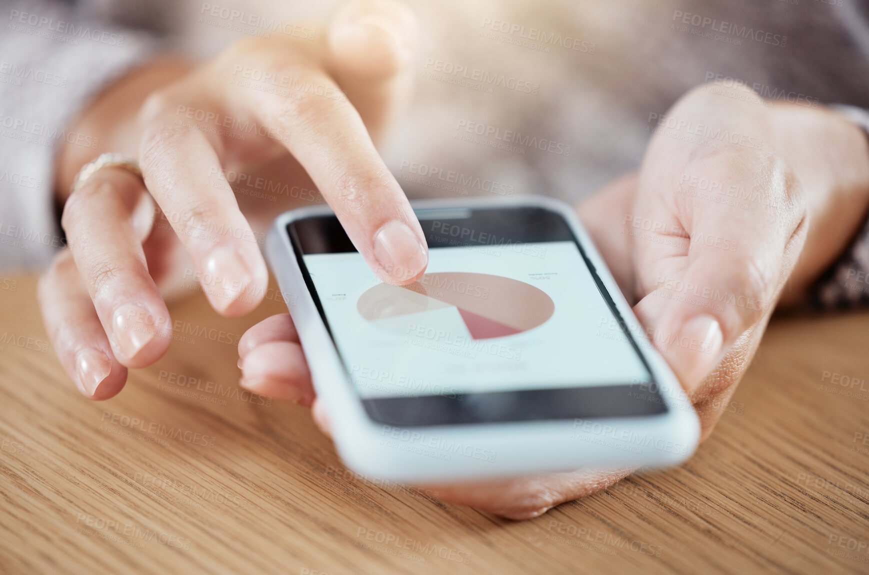 Buy stock photo Woman with phone, work on digital chart or graph for online work at fintech company. Closeup of smartphone in lady hands on table, with financial performance data or analytics of finance business