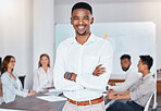 African businessman smile, during meeting at work while staff talk at table in office or boardroom. Black man happy in corporate hall, workers have conversation or planning new strategy for company