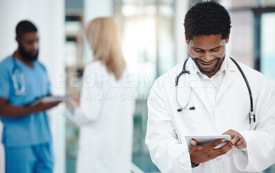 Buy stock photo Happy African doctor, smile use tablet to read social media post or email with good news. Healthcare professional at work, use mobile technology for communication on the internet or chat app