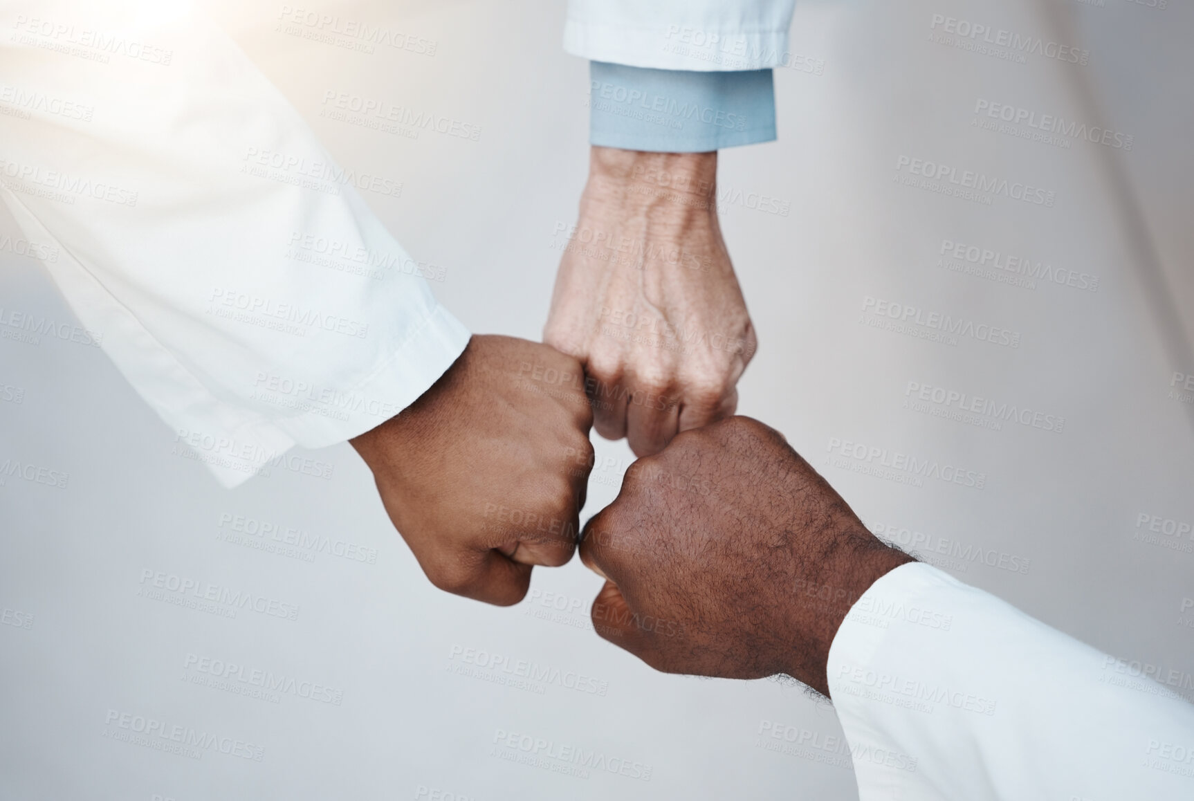 Buy stock photo Trust, teamwork and hand fist together in solidarity with medical ethics in the workplace. Support of diverse professional healthcare work people in organization with respect and loyalty. 