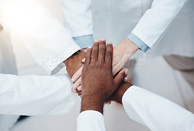 Buy stock photo Collaboration, motivation and support with hands of doctors from top view, working in healthcare, vision and innovation. Diversity, teamwork and goals with group of medical professionals for trust