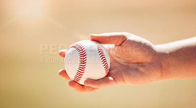 Baseball, sports and sport exercise of a hand about to pitch and throw in nature. Fitness, training and team player workout of a athlete in the sun outdoor holding a ball for a game in sunshine