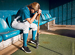 Baseball, sports bench and woman athlete angry thinking of game loss while waiting to play. Frustrated, sad and serious softball player girl in depressed mood for professional match failure.