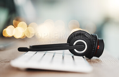 Buy stock photo Call center headphones, computer keyboard and telemarketing background in office for contact us, video call and virtual online consulting. Zoom of customer support help desk, technology and connection