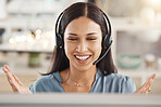 Call center, telemarketing or customer support agent consulting clients with headset in office. Happy employee working on ecommerce sales, online consultation and customer service crm with technology