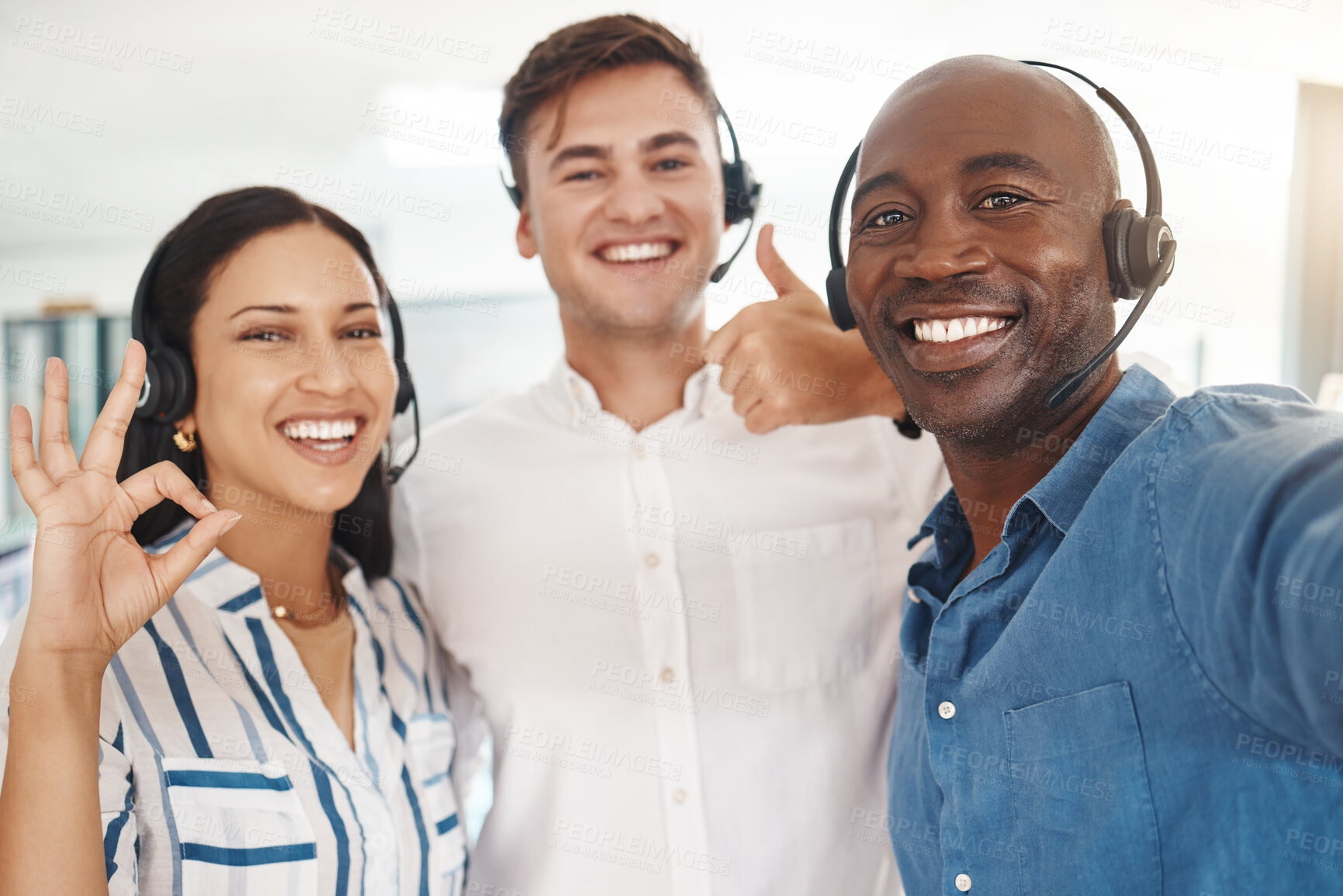 Buy stock photo Woman, men and selfie of call center agents with headset, thumbs up and ok. Teamwork, support and help, friendly, excited telemarketing or crm team. Group of happy customer service consultant smiling