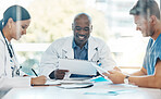 Doctor have conversation about medical document in a meeting together at work. Healthcare workers talking while planning, communication and strategy in a hospital office or boardroom with teamwork