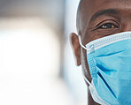 Black man doctor with covid face mask face portrait for African healthcare insurance. Sad, fear and risk in eye of a medical worker with safety gear for human surgery during corona virus pandemic