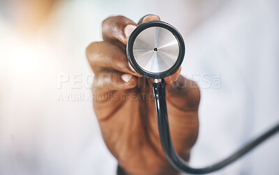 Buy stock photo Stethoscope, healthcare and medicine with the hand of a doctor listening to a heartbeat or breathing in a hospital. Medical, insurance and consulting with a medical or health professional in a clinic