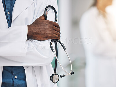 Buy stock photo Healthcare, stethoscope in hand and African doctor in hospital. Black man or medical worker, leader in medicine and innovation in treatment. Confident, professional and expert patient care in Africa.