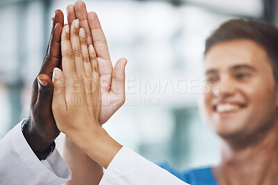 Buy stock photo Hands, high five and collaboration with a team of a doctor, nurse and health professional working in the hospital. Teamwork, motivation and support with a medical group at work in a clinic for care