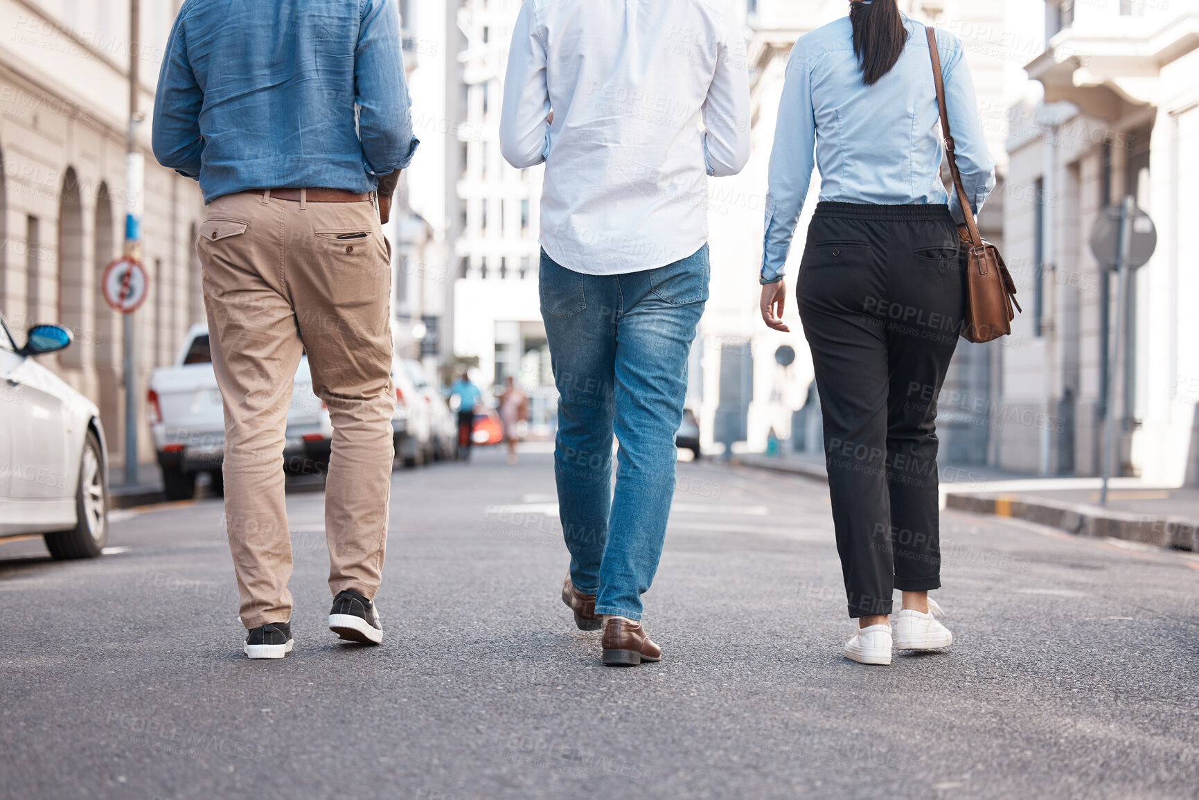 Buy stock photo Friends, walking and city with a woman and men on a walk together outside in the city. Friendship, commute and travel with a friend group outdoor in town for exploration and sightseeing in the day