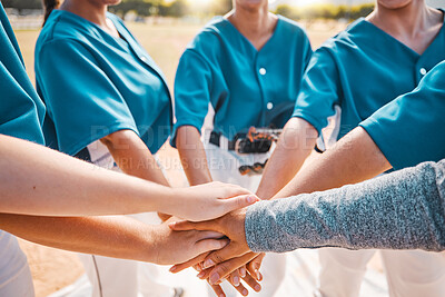Buy stock photo Hand, sports and teamwork with a sport team putting their hands in a huddle while standing in a circle outdoor on a field. Collaboration, goal and motivation with a group of women training for a game