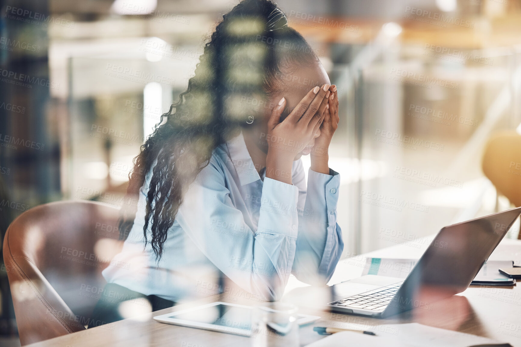 Buy stock photo Stress, anxiety and burnout with a business woman suffering with mental health in her office at work. Headache, fatigue and overtime with a stressed female employee at work on a laptop at her desk