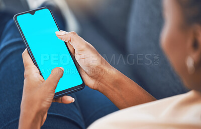 Buy stock photo Black woman, hands and phone with green screen mockup for marketing, branding and advertising. African female hand on mobile technology with blank display for social media, texting and message or app