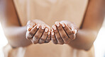 Religion, open hands and a praying woman in a christian worship church for spiritual wellness. Closeup of palms of an african girl with a give and receive gesture at a community charity event.