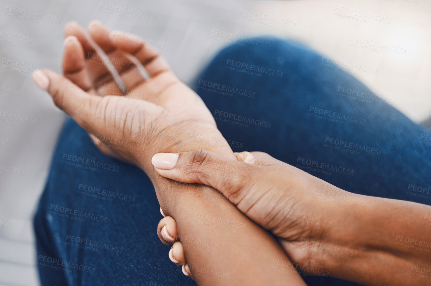 Buy stock photo Hands, arm injury or pain of black woman after working hard in home or house interior. Hand, health and wellness of African female injured wrist after work on pc computer, carpal tunnel or arthritis.