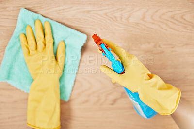Buy stock photo Cleaning spray, glove hands and wipe table, counter and wood surface for housekeeping service at home. Above of maid, janitor and cleaner dust cloth chore, furniture shine and chemical bottle product