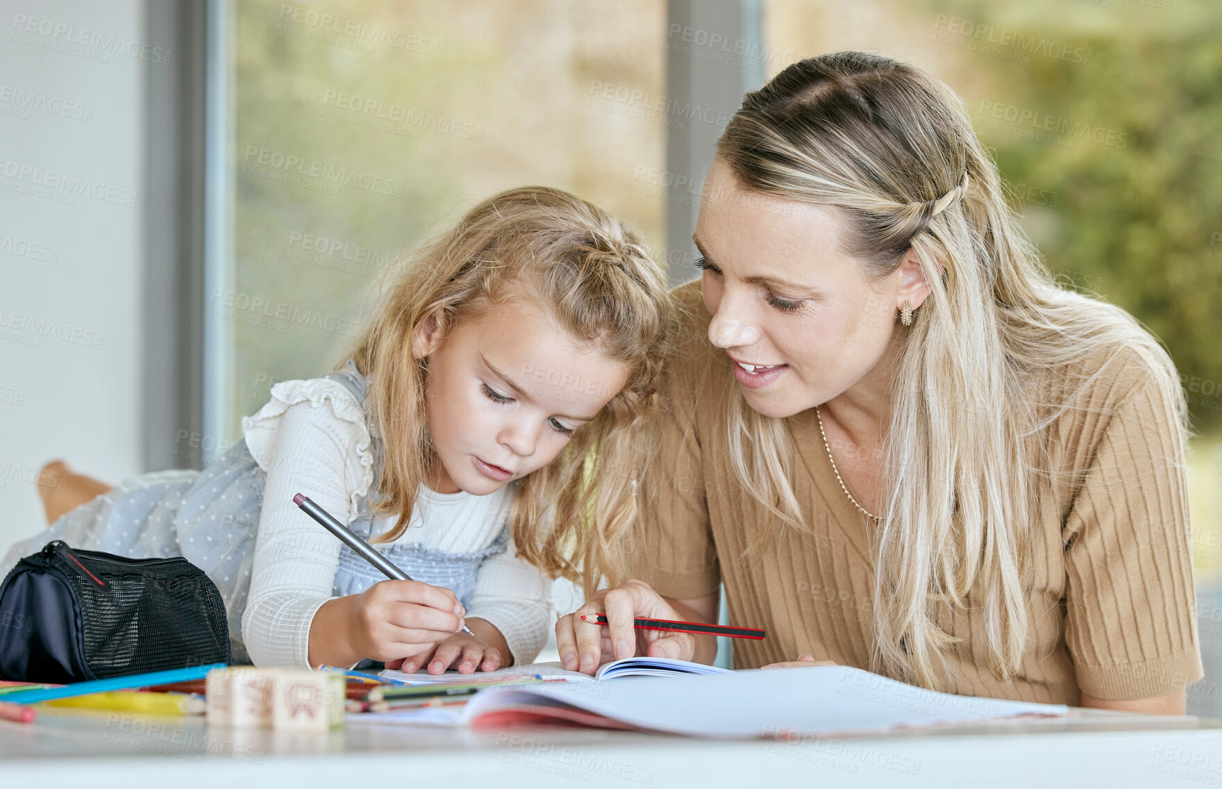 Buy stock photo Mother help youth girl with school work, homework or preschool education while writing in notebook. Mom helping, teaching or tutor daughter, student or young learning kid in math, history or english