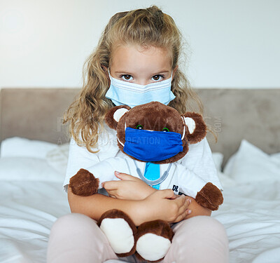 Buy stock photo Covid, girl and teddy bear love and care for safety and awareness in pandemic quarantine at home. Portrait of a little kid playing doctor holding cute fluffy toy with mask for healthcare in pandemic