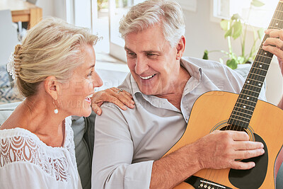 Buy stock photo Senior couple with guitar for music and singing together on sofa for retirement lifestyle and summer lens flare. Happy elderly woman or creative musician people in living room home playing love song