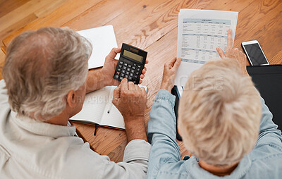 Buy stock photo Budget, finance and senior couple with calculator planning financial investments, mortgage and tax papers. Elderly woman counting bills, debt and pension fund on bank statement with partner at home