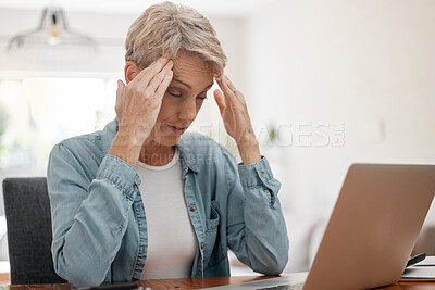 Buy stock photo Stress, headache and a woman with gray hair at laptop in living room. Audit, home finance and debt, overworked and tired senior lady working on tax report or retirement fund paperwork online at home.