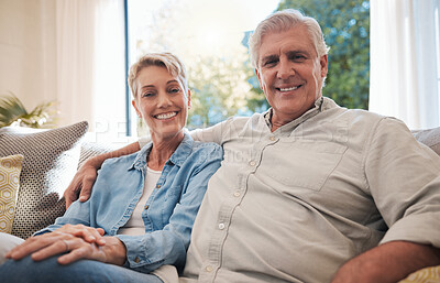 Buy stock photo Couple, love and retirement with a senior man and woman sitting together in the living room of their home. Happy, smile and affection with an elderly male and female pensioner in their house to relax