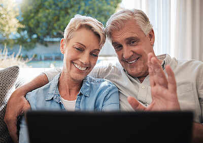Buy stock photo Senior couple, laptop and video call greeting in living room talking, communication and speaking on sofa at house. Elderly, love and retirement man and woman on family home pc wifi video conference