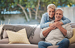 Mature couple, love bond and hug on house patio, home garden sofa and relax furniture chair in backyard. Portrait of smile, happy and retirement senior or man and woman in trust, security and safety