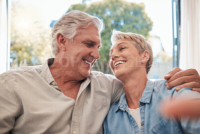 Buy stock photo Love, elderly and selfie with retirement couple in home relaxing with romantic eye contact. Married and happy pension people in relationship with care, trust and respect photograph together.
