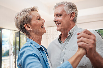 Buy stock photo Elderly, happy and dancing couple in living room, enjoying retirement. Portrait of senior man and woman who dance together in their home, smiling, loving and romantic. Family, love and fun old people