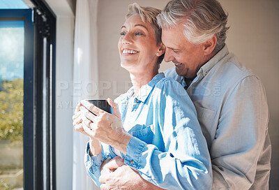 Buy stock photo Love, senior couple and retirement vacation while sharing a hug, drinking coffee and looking out window at home or in a hotel. Happy mature man and woman sharing a special bond and laughing together