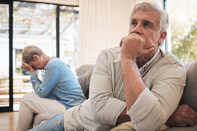 Buy stock photo Elderly couple stress after conflict, sad news or fight in living room of their home. Senior man with woman in retirement on sofa with expression of disappointment, angry or depressed in house
