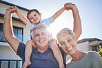 Happy grandparents, smile with child outside home and relax in retirement. Senior man, elderly woman and boy play in garden sun love time together. Kid on holiday, laughs and create childhood memory
