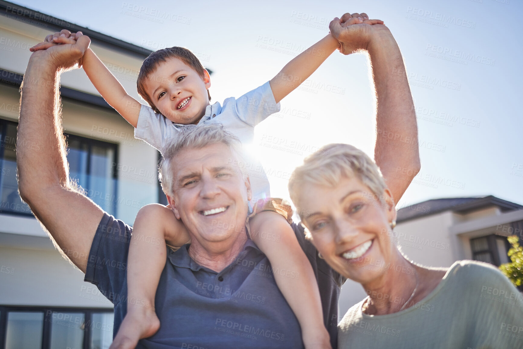 Buy stock photo Happy grandparents, smile with child outside home and relax in retirement. Senior man, elderly woman and boy play in garden sun love time together. Kid on holiday, laughs and create childhood memory
