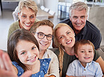 Family, children and selfie in bond with men, women and kids in house living room or home interior. Portrait, smile and happy mother, father and seniors with girl and boy for social media photograph