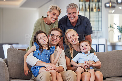 Buy stock photo Big family, love and smile of children, parents and grandparent sharing a bond and support while sitting on sofa at home. Portrait, happiness and multi generation men and woman spending time together