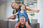 Happy senior grandfather on couch in home together on sofa with adult daughter and grandchild in retirement and love. Portrait of woman play and smile with kid, father and girl relax in living room