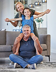 Mother, girl or grandfather in fun family portrait in house living room or home interior and bonding in playful game. Smile, happy or trust man and woman with children or kids on floor by lounge sofa