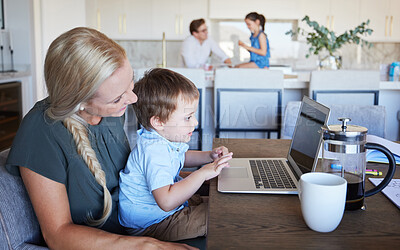 Buy stock photo Mother, kid and laptop at table in living room with father and girl in background. Work from home mom on coffee break with son. Child development, family time and relax, a mothers love for children