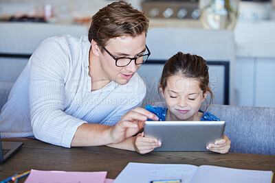 Buy stock photo Education, learning and child development on digital tablet with father and daughter watching educational program at a table. Homework, homeschool and teaching parent help child with online homework