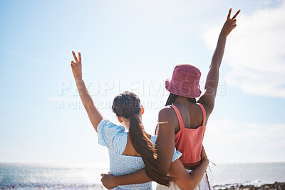 Buy stock photo Peace hands sign, friends and beach holidays outdoors to enjoy freedom, happiness and a fun lifestyle in nature. Diversity, travel and young girls at sea with holiday vacation trip together