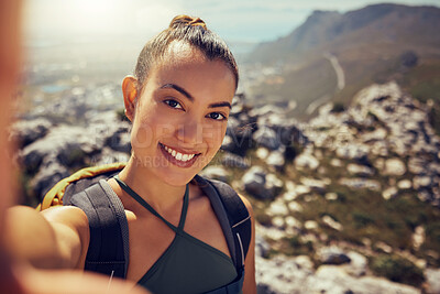Buy stock photo Portrait, happy and woman hiking with a selfie in nature on a mountain during summer. Face, fitness and exercise latin woman or tourist smile while exploring during a trekking outdoor with backpack
