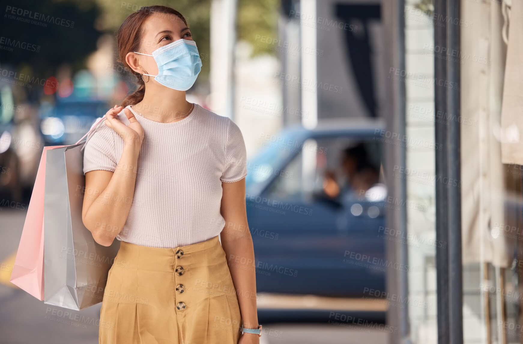 Buy stock photo Covid shopping, city fashion and woman with face mask for security from virus, in the street of shopping mall and with retail bag. Sick girl customer with covid 19 being safe while in the urban town